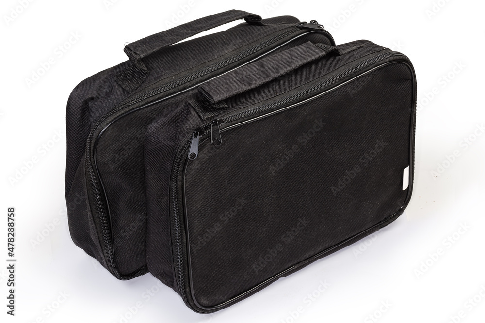 Naklejka premium Small flat black textile bags with handles on white background