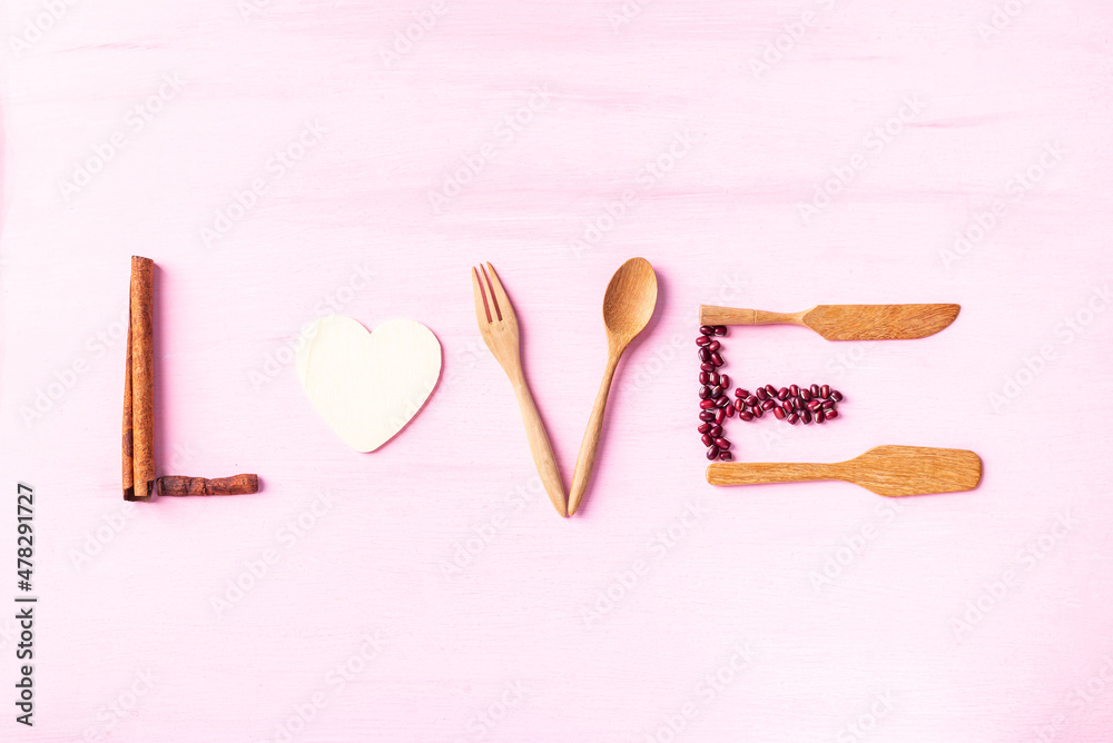 Love made from food ingredient and crokery on pink background, Valentine day concept