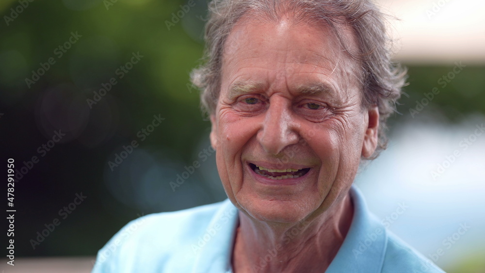 Older man laughing and smiling, portrait senior person real life laugh and smile