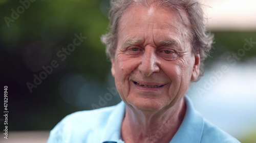 Older man laughing and smiling, portrait senior person real life laugh and smile
