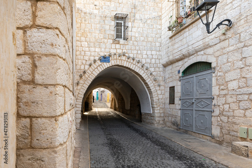 Fototapeta Naklejka Na Ścianę i Meble -  Tunnel  under a residential building on Star Street in Bethlehem in Bethlehem in the Palestinian Authority, Israel