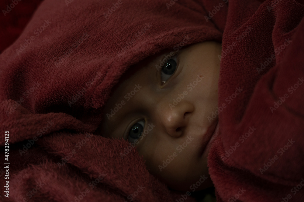 the boy wrapped himself in a plaid