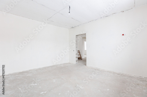 interior of the apartment without decoration in gray colors