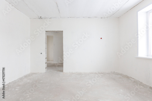 interior of the apartment without decoration in gray colors