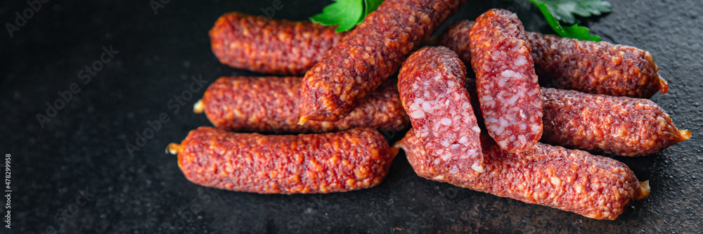 smoked sausages jerky hunting sausage healthy meal food snack on the table copy space food background rustic smoked sausages jerky hunting sausage healthy meal food snack on the table copy space food background rustic