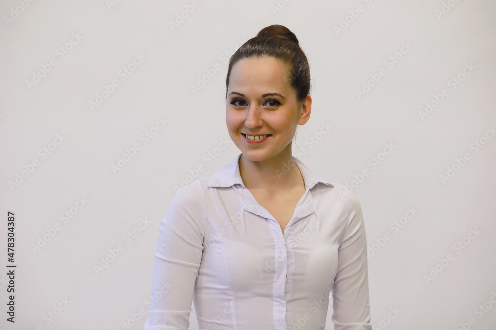 Young beautiful girl in casual clothes. The student prepares for the session. Young beautiful girl in casual clothes. The student prepares for the session.