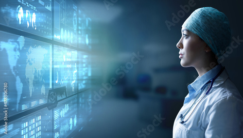 Female surgeon wearing white coat, stethoscope and surgical cap looking at data on digital screen. Medical technology innovation. 3d illustration