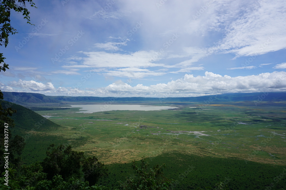 Spectacular view onto the vast Ngorongoro Crater with Lake Magadi inside Spectacular view onto the vast Ngorongoro Crater with Lake Magadi inside