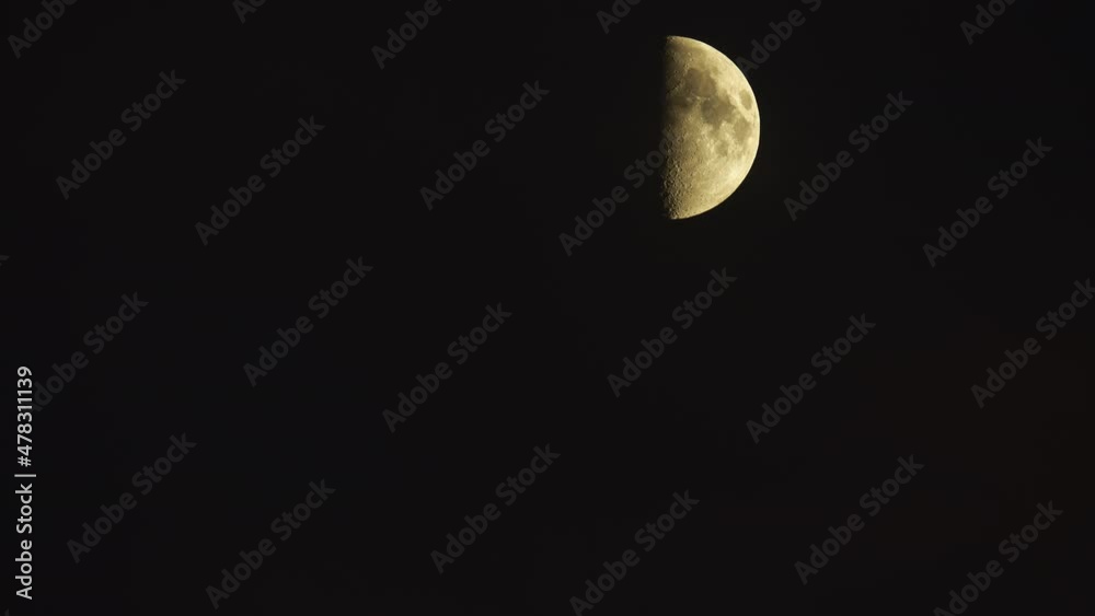Half moon at night on dark black sky. Half moon at night on dark black sky.