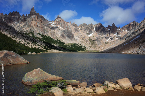 Mountain landscape with lake  Nahuel Huapi National Park  Toncek lagoon surrounded by steep granite rocks and Torre Principal peak of Cerro Catedral mountain  Nature of Patagonia  Argentina