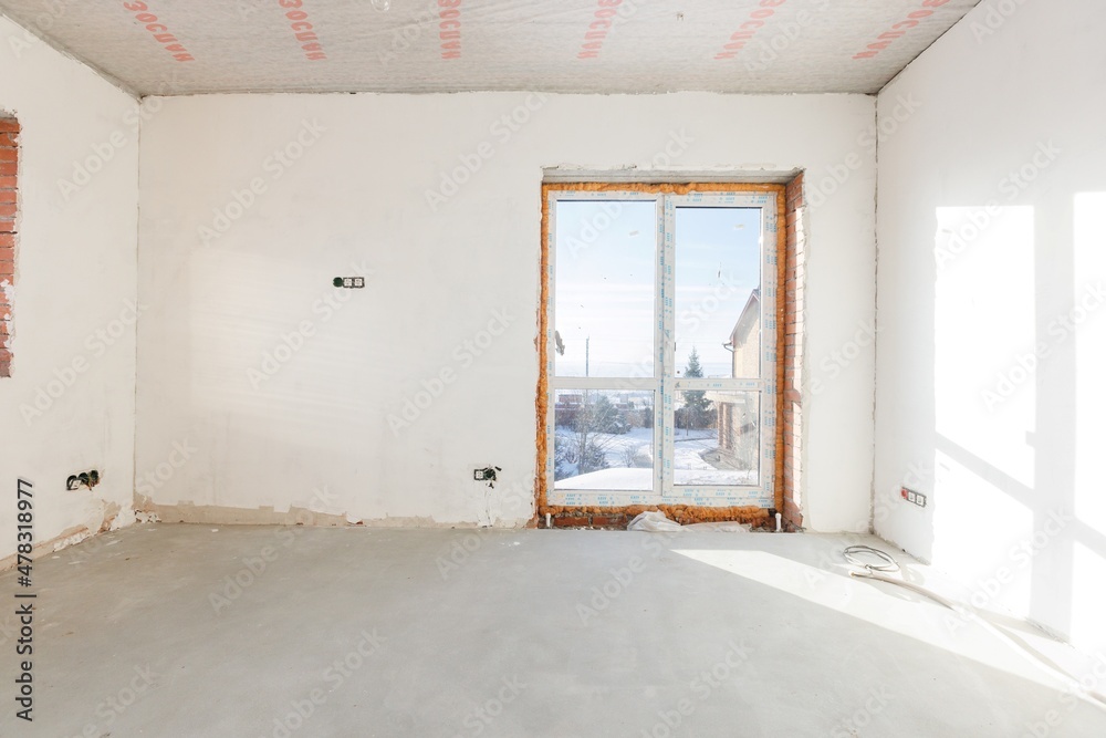 Fototapeta premium interior of the apartment without decoration in gray colors