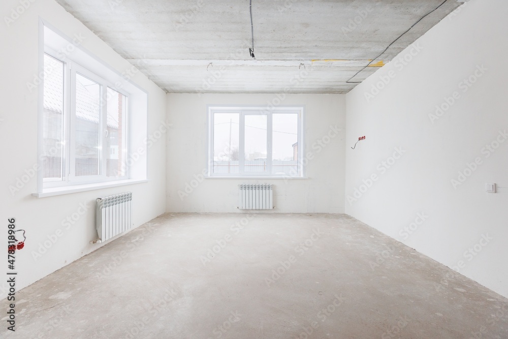 Fototapeta premium interior of the apartment without decoration in gray colors