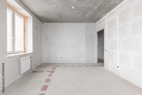 interior of the apartment without decoration in gray colors