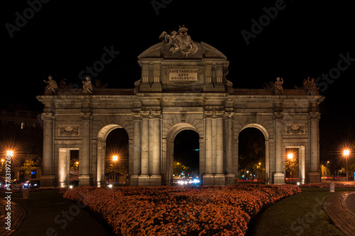 Madrid, Spain, October 2019 - view of the beautiful Puerta de Alcalá (Alcala Door) by the night