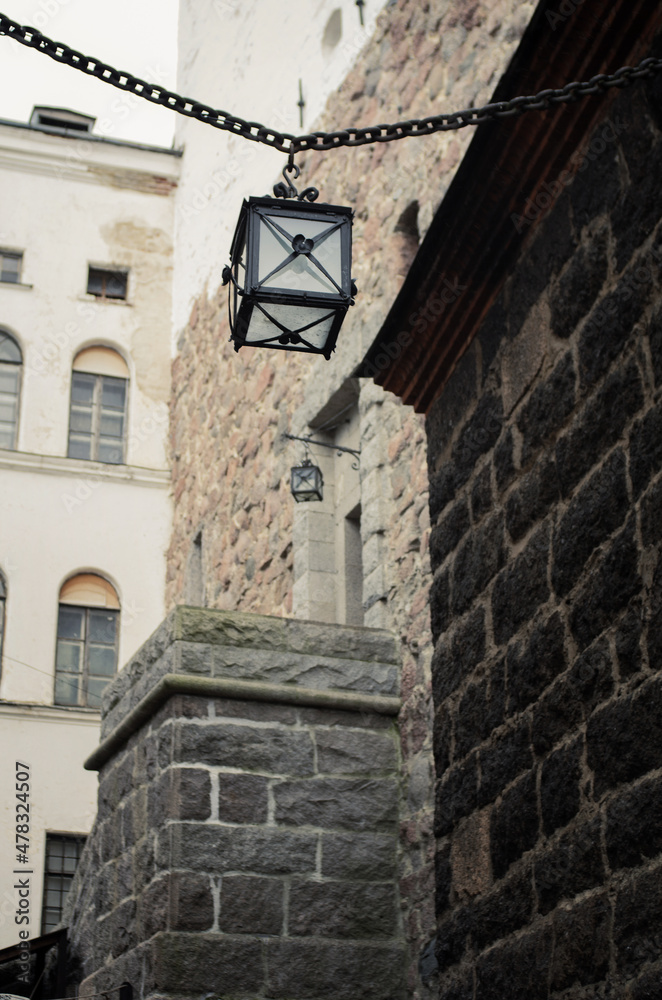 Antique lantern over the street.