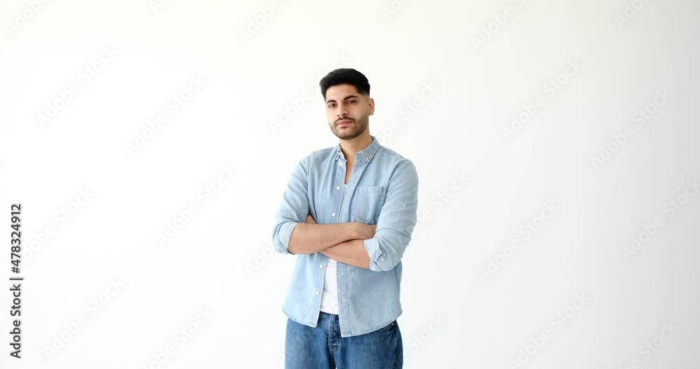 Serious man with arms crossed over white background Serious man with arms crossed over white background