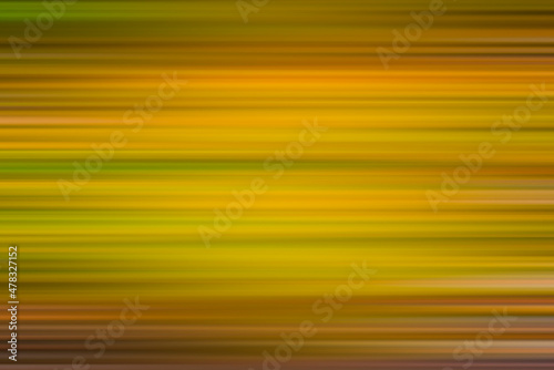 Blurred concentrated horizontal yellow and green stripes with brown vignette. Background