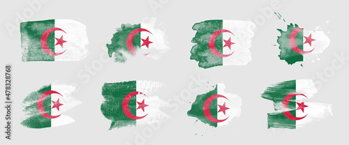 Painted flag of Algeria in various brushstroke styles.