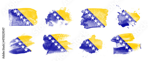 Painted flag of Bosnia and Herzegovina in various brushstroke styles. photo