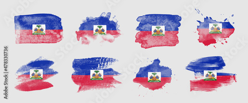 Painted flag of Haiti in various brushstroke styles.