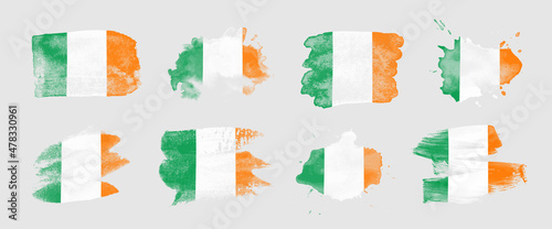 Painted flag of Ireland in various brushstroke styles.