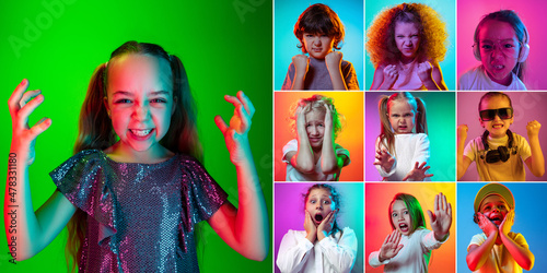 Set of portraits of emotional little cute kids, boys and girls isolated on multicolored studio background in neon light. Emotions, facial expression, childhood concept © master1305