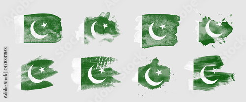 Painted flag of Pakistan in various brushstroke styles.