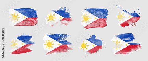 Painted flag of the Philippines in various brushstroke styles.