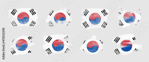 Painted flag of South Korea in various brushstroke styles.