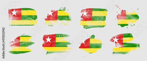 Painted flag of Togo in various brushstroke styles.