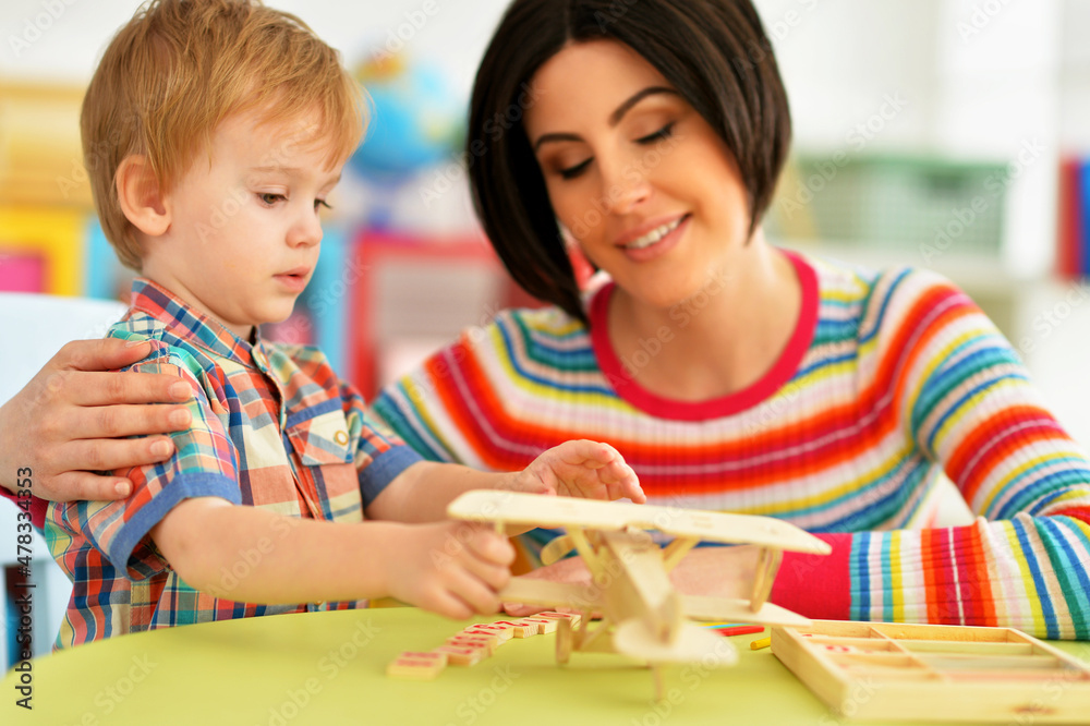 © aletia2011 - Young mother and cute little son playing