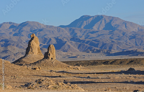 Two pinnacles with surrounding mountains in background, Trona Pinnacles, California