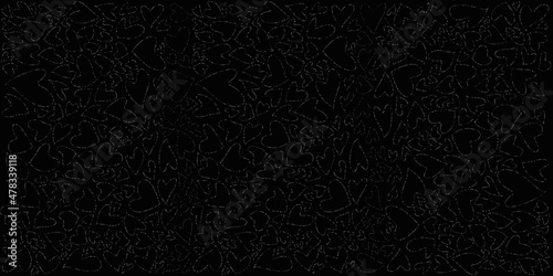 heart shape doddle pattern on black background photo