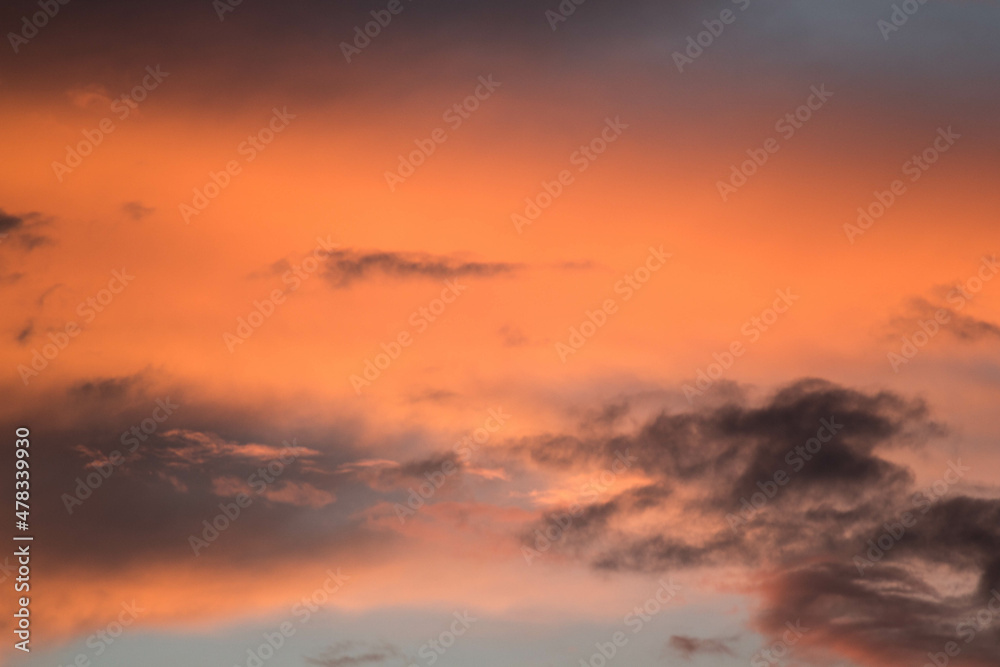 Orange pink vanilla sky at sunset photo