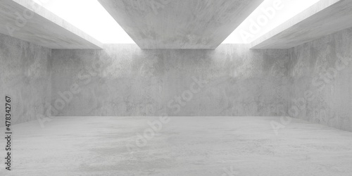 Empty modern abstract concrete room with light thru two rectangular ceiling openings left and right and rough floor - industrial interior background template