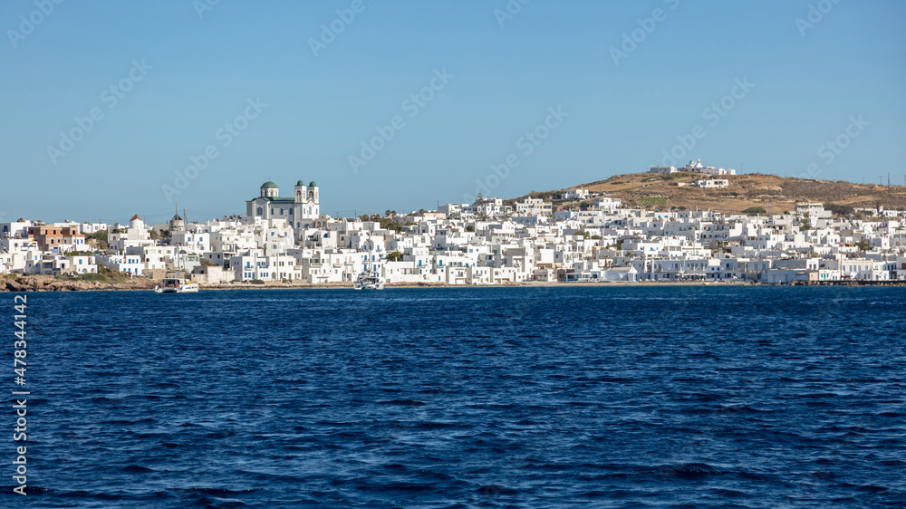 Paros island panoramic view of Naoussa village Cyclades Greece. Calm sea blue sky background.
