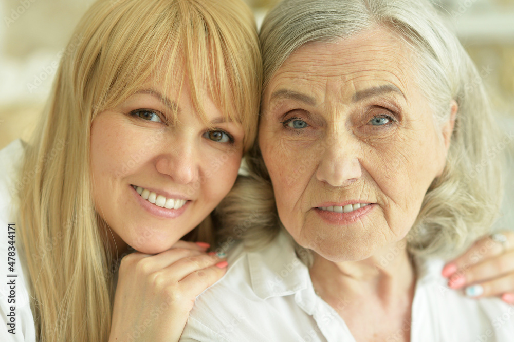 Portrait of senior woman with daughter at home Portrait of senior woman with daughter at home