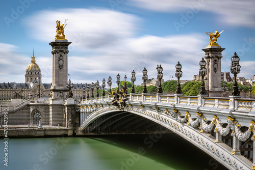 Pont Alexandre III Bridge over the Seine River with view of the Invalides (UNESCO World Heritage Site). 7th Arrondissement, Paris, France