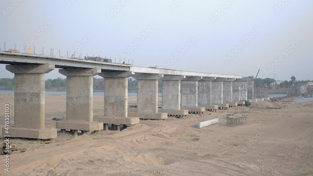 Side view of the river bridge under construction Side view of the river bridge under construction