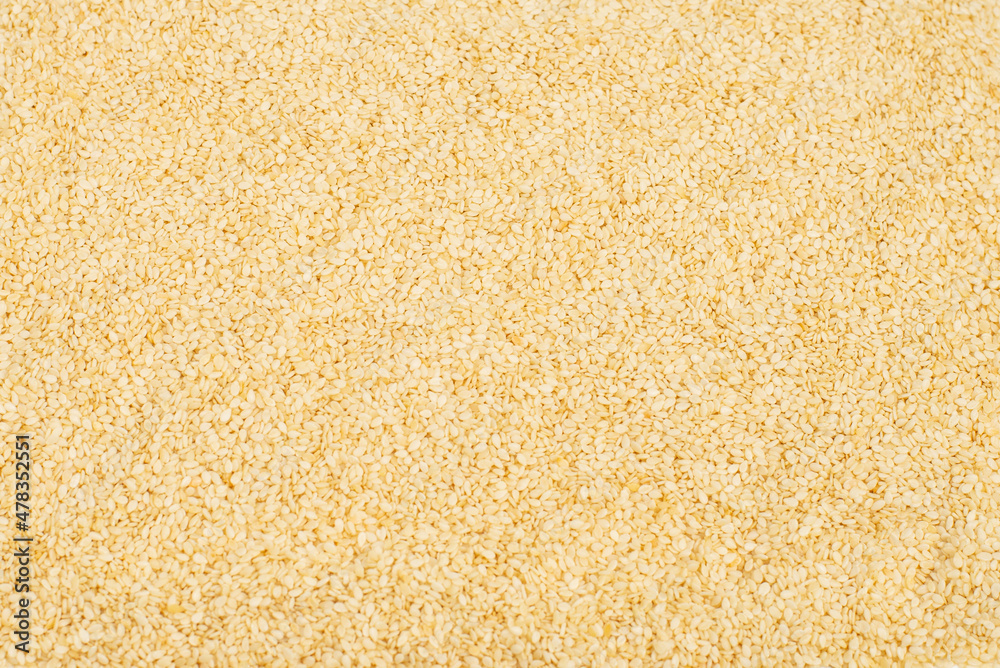Sesame seeds as a background.
