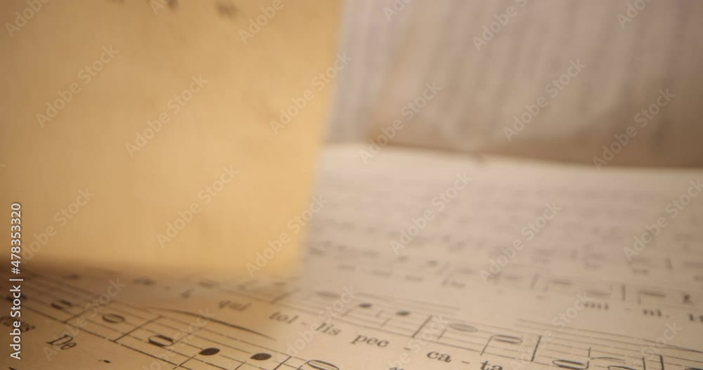 Musical notes, old musical note paper sheet. Super macro close up shoot fly over laowa 4k