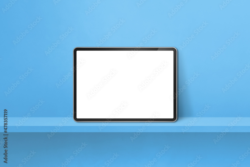 Digital tablet pc on blue wall shelf. Horizontal background banner Digital tablet pc on blue wall shelf. Horizontal background banner