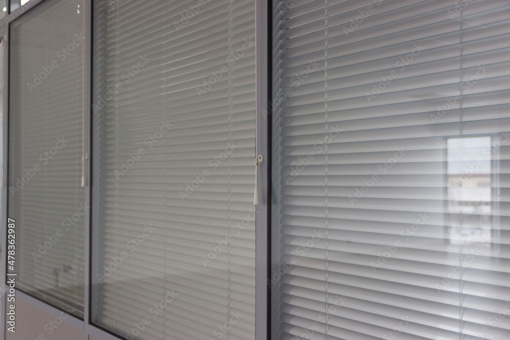Glass office partitions with shutters Glass office partitions with shutters
