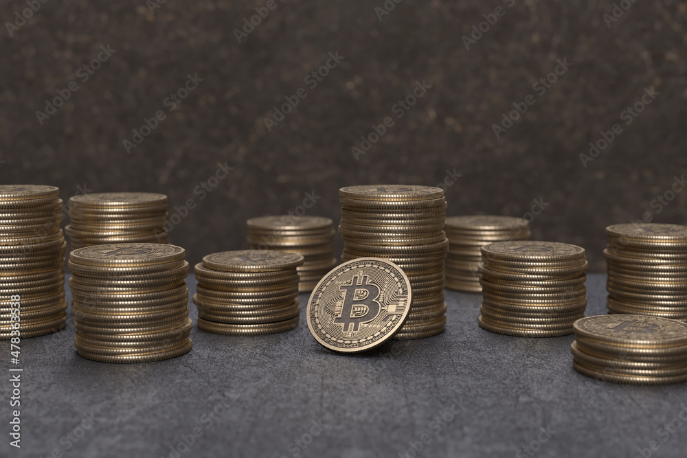 Bitcoin Cryptocurrency represented as Gold Coins on a table. Grunge style, Future Business Background. 3D Render Bitcoin Cryptocurrency represented as Gold Coins on a table. Grunge style, Future Business Background. 3D Render