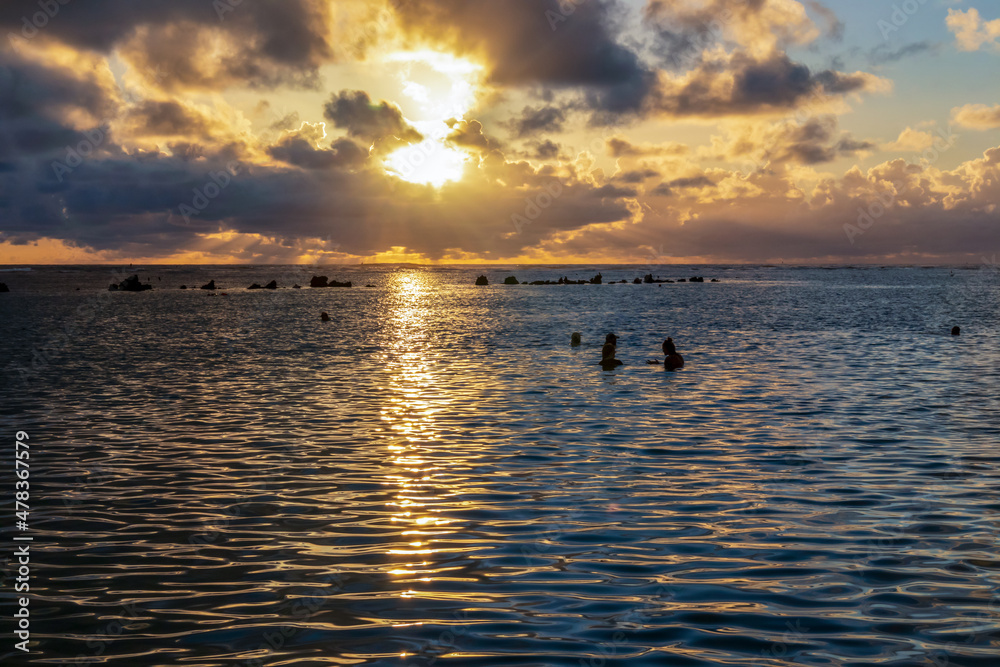 Sunset on the ocean viewed from Ala Moana Beach and Regional Park