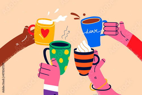 Diverse friends enjoy warm drinks relax on weekend 