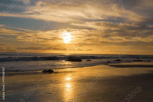Sunset on the beach over the Pacific Ocean