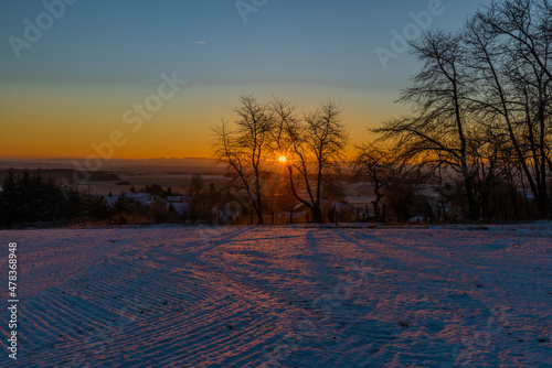 Sunrise near Ctibor and Halze villages in cold snowy morning photo