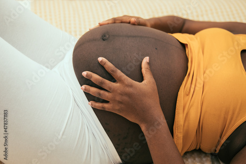 pregnant belly of a black woman
