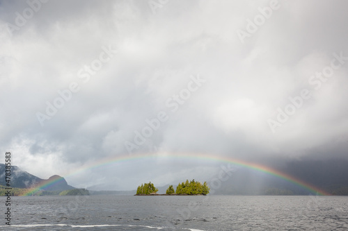 Rainbow over a small island near Tofino, Clayoquot Sound, Vancouver Island, B.C., Canada. photo